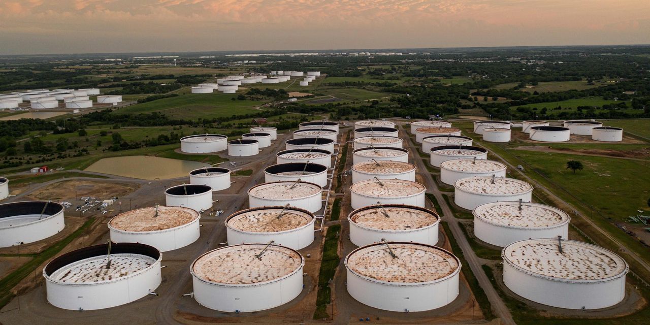 Oil prices trade higher as U.S. supplies fall by more than 3 million barrels in two weeks