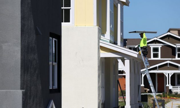 Home builders cut prices and slow construction as buyers pull back, survey shows