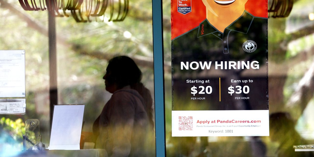 Jobless claims fall to one-month low of 243,000 with no sign of surging layoffs