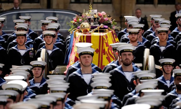 Queen's coffin being taken through London on gun carriage