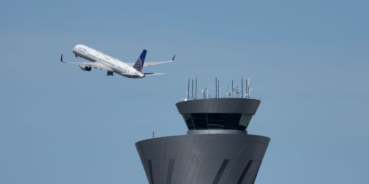 Airline stocks climb after American Airlines raises revenue outlook