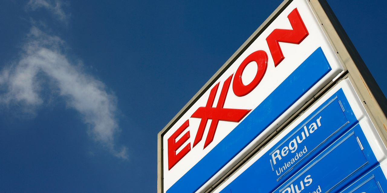 Exxon Mobil and Chevron together take in more than $30 billion in net income as natural gas prices soared