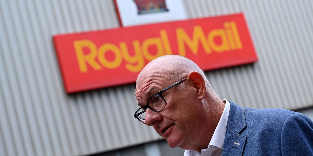 Royal Mail may lay off up to 6,000 after loss in first half