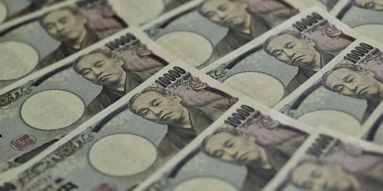 Soaring U.S. dollar spikes above key 150 yen level as Japanese currency slides to 32-year low